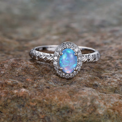 Olivenorma Oval Opal Besatz geflochtenes Seil Muster Ring