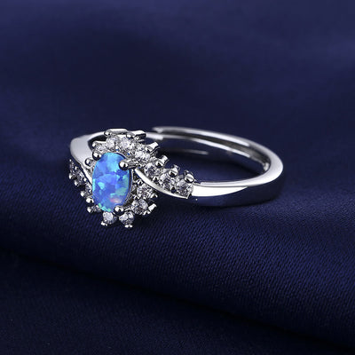 Olivenorma „Surrounding“ Blauer Opal Verstellbarer Ring