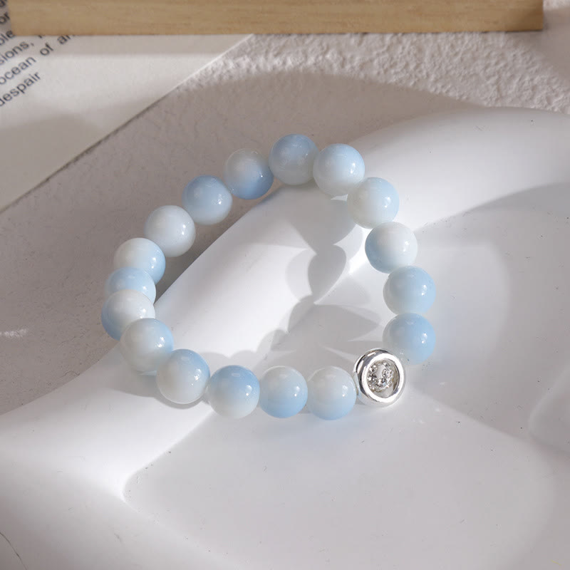 Olivenorma Armband mit blauen Glas-Kristallperlen 