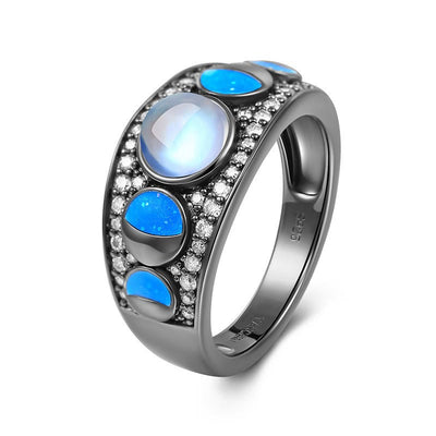 Olivenorma Mondstein Opal Breiter Rand Silber Schwarz Ring