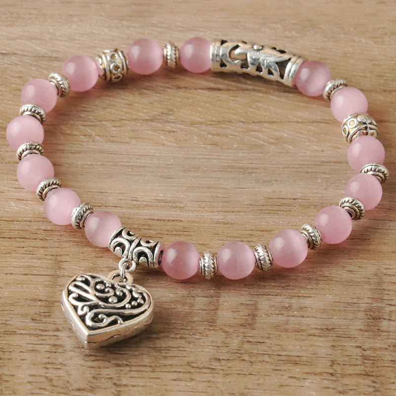 Olivenorma Hohl-Liebe-Anhänger Pink-Katzenauge-Armband 