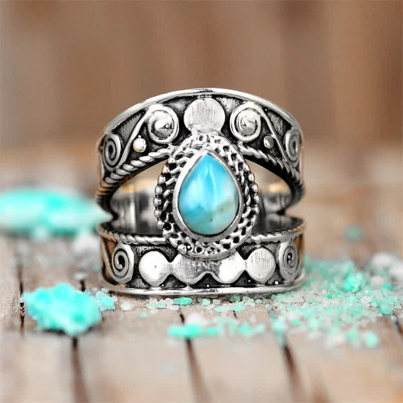 Olivenorma Tränenförmiger Larimar-Ring mit graviertem Muster