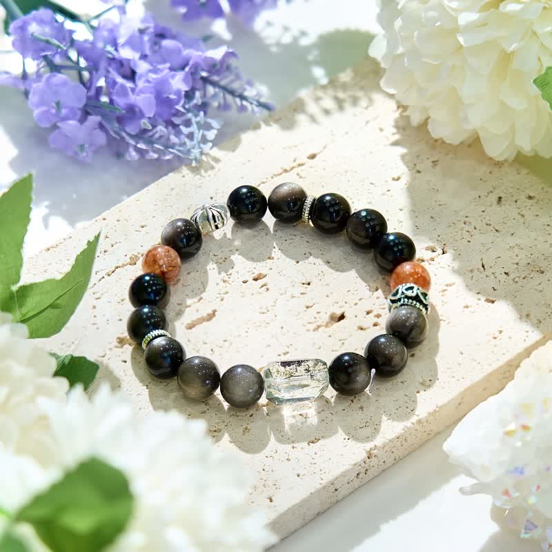 Olivenorma Armband mit Kreuzanhänger aus Sonnenstein und Obsidian in Silber 