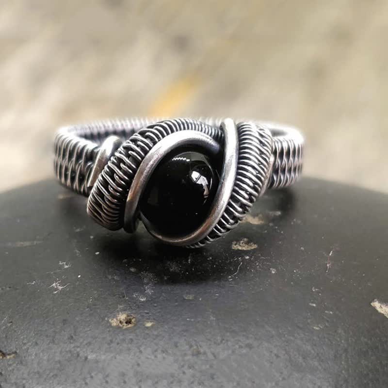 Olivenorma Herrenring mit schwarzem Onyx und Knoten