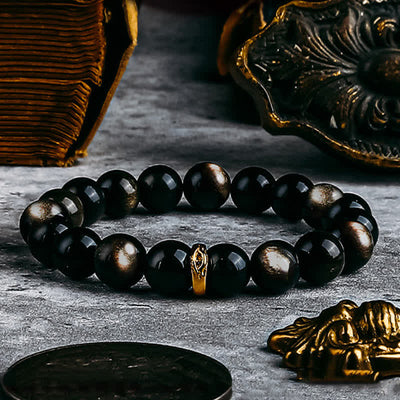 Olivenorma Armband mit Perlen aus natürlichem Obsidian und bösem Blick in Gold und Silber