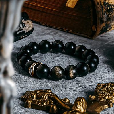 Olivenorma Armband mit Perlen aus natürlichem Obsidian und bösem Blick in Gold und Silber