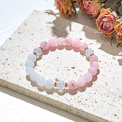 Olivenorma Armband mit Perlen aus klarem Kristall und rosa Opal