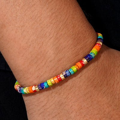 Olivenorma Farbiges Chakra-Rollerperlen-Armband, verstellbar 