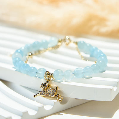 Olivenorma Armband mit Anhänger aus natürlichen Aquamarinperlen und Rehkitz