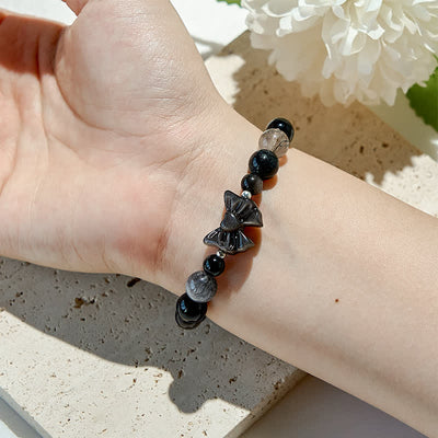 Olivenorma Armband mit Schleife und Natur-Obsidianperlen