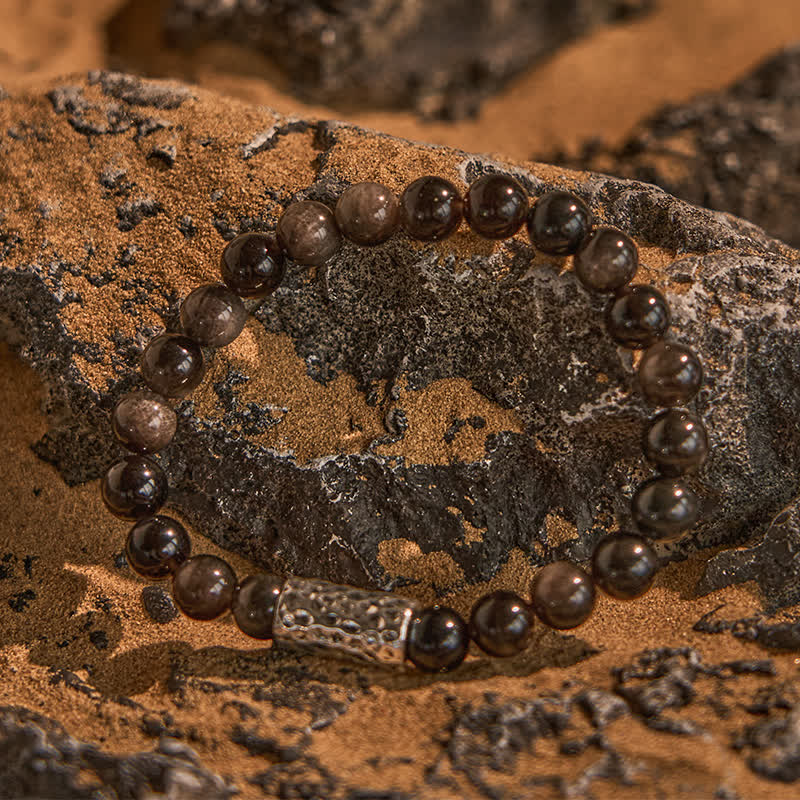 Olivenorma Silbernes Perlenarmband mit Metallsäulen aus Obsidian