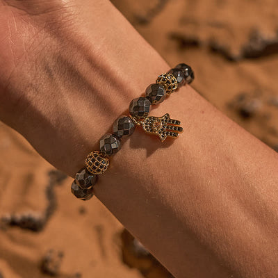 Olivenorma Armband mit Hamsa-Anhänger aus Hämatitperlen 