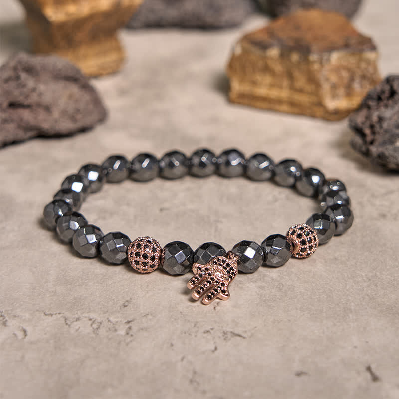 Olivenorma Armband mit Hamsa-Anhänger aus Hämatitperlen