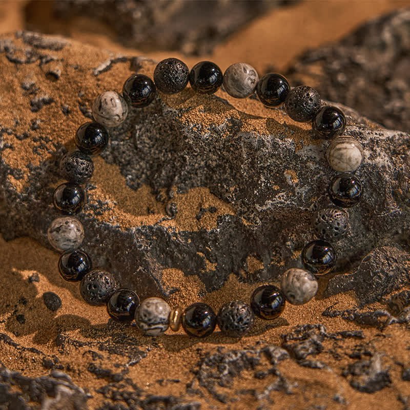 Olivenorma Perlenarmband aus grauem Jaspis, Obsidian und Lavastein