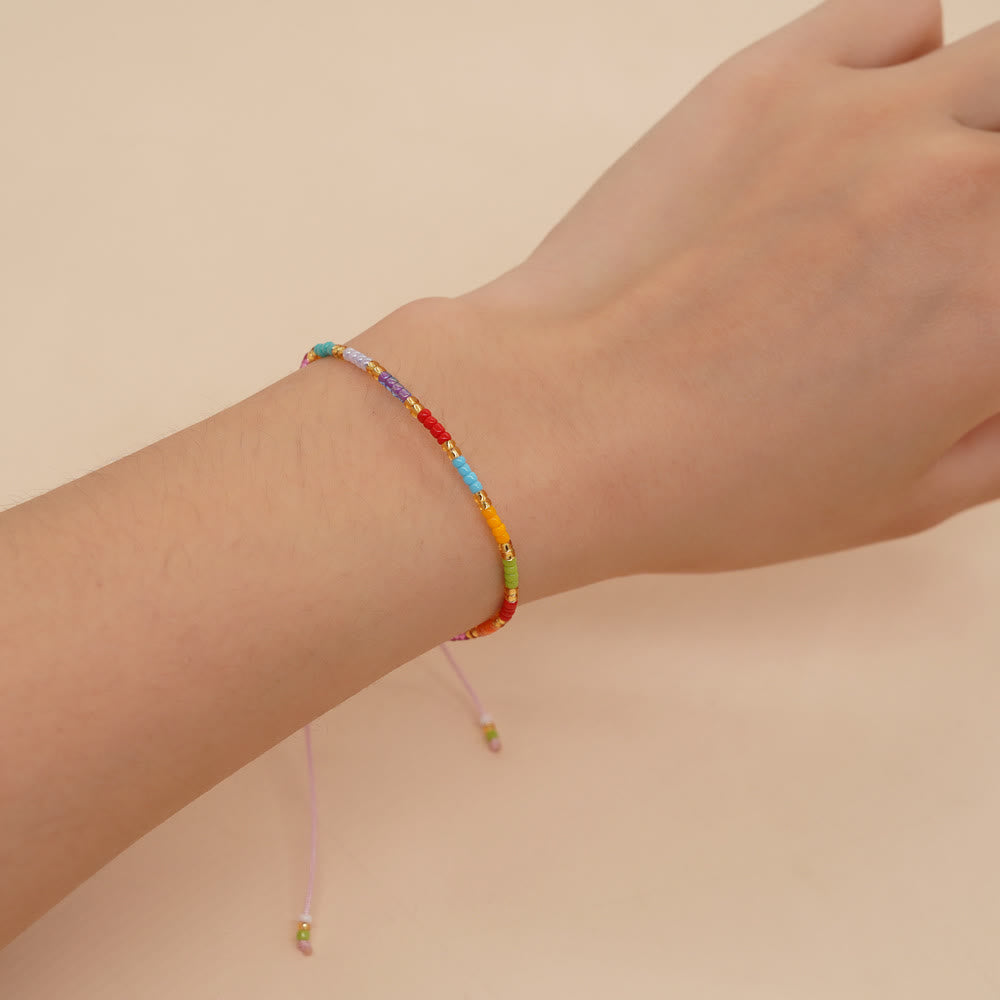 Olivenorma Verstellbares Armband mit bunten Reisperlen