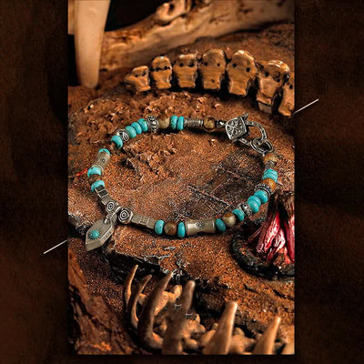 Olivenorma „Tribal Secrets“ Türkises Perlenarmband aus Bildjaspis