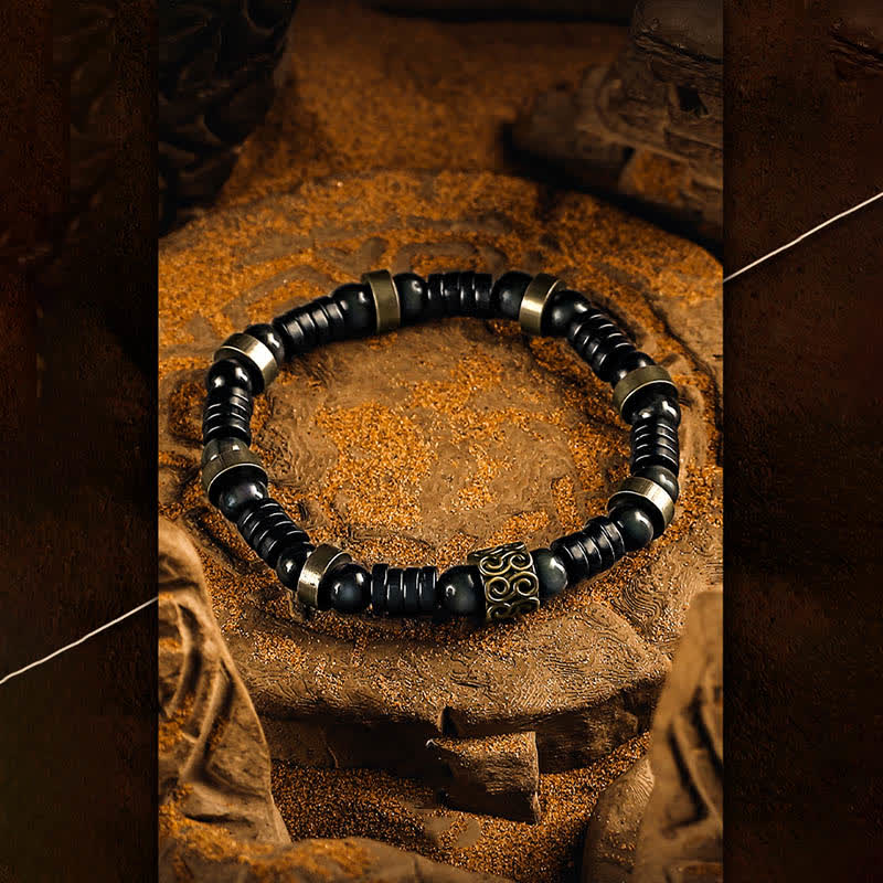 Olivenorma Silbernes Perlenarmband aus Obsidian und Kokosnussschale