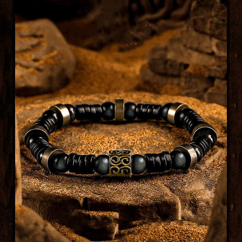 Olivenorma Silbernes Perlenarmband aus Obsidian und Kokosnussschale