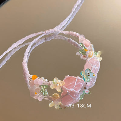 Olivenorma – Handgefertigtes, farbenfrohes Armband mit geflochtenen Blumen aus natürlichem Kristall