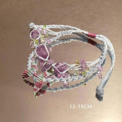 Olivenorma – Handgefertigtes, farbenfrohes Armband mit geflochtenen Blumen aus natürlichem Kristall