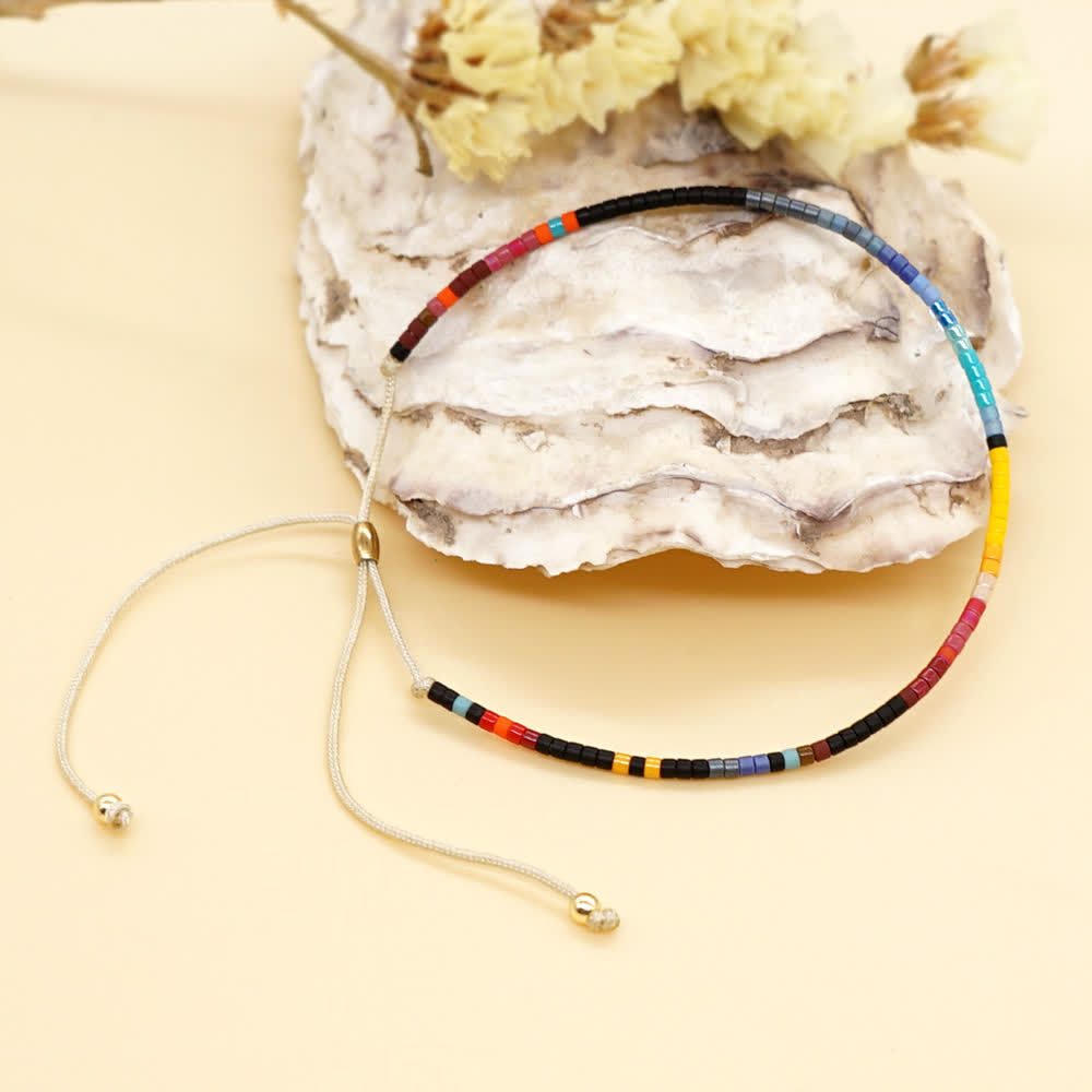 Olivenorma Armband mit Kordelzug, bunt, Reisperlen, Beige