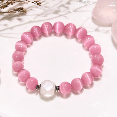 Olivenorma Glitzerndes Perlenarmband mit Katzenaugenstein in Rosa