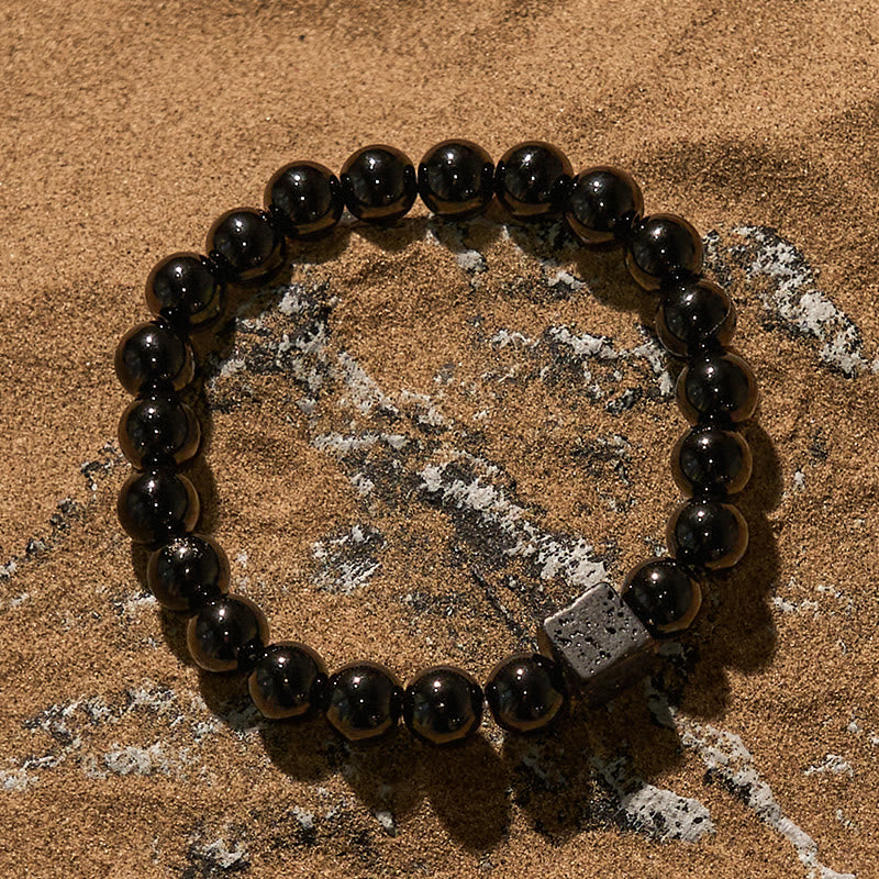 Olivenorma Armband mit Perlen aus Lavastein und Obsidian im Würfelschliff