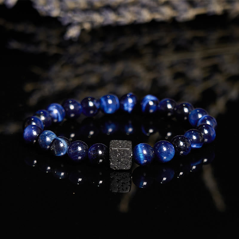 Olivenorma Armband mit Perlen aus Lavastein und blauem Tigerauge