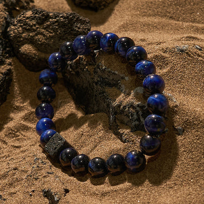 Olivenorma Armband mit Perlen aus Lavastein und blauem Tigerauge