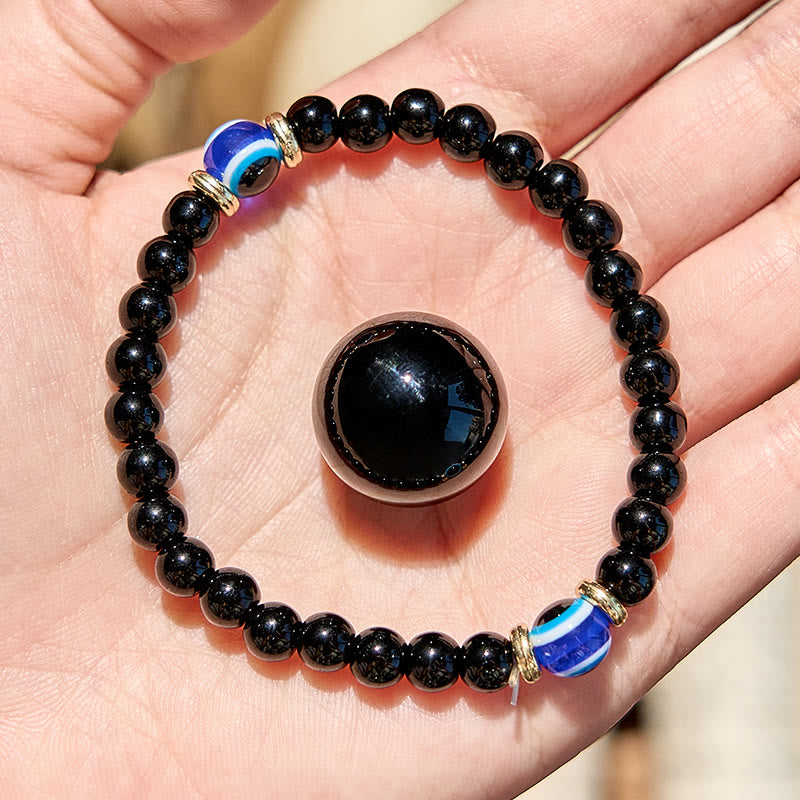 Olivenorma Armband mit Perlen aus natürlichem schwarzen Onyx und bösem Blick