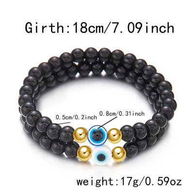 Olivenorma Armband mit Perlen aus natürlichem schwarzen Onyx und bösem Blick