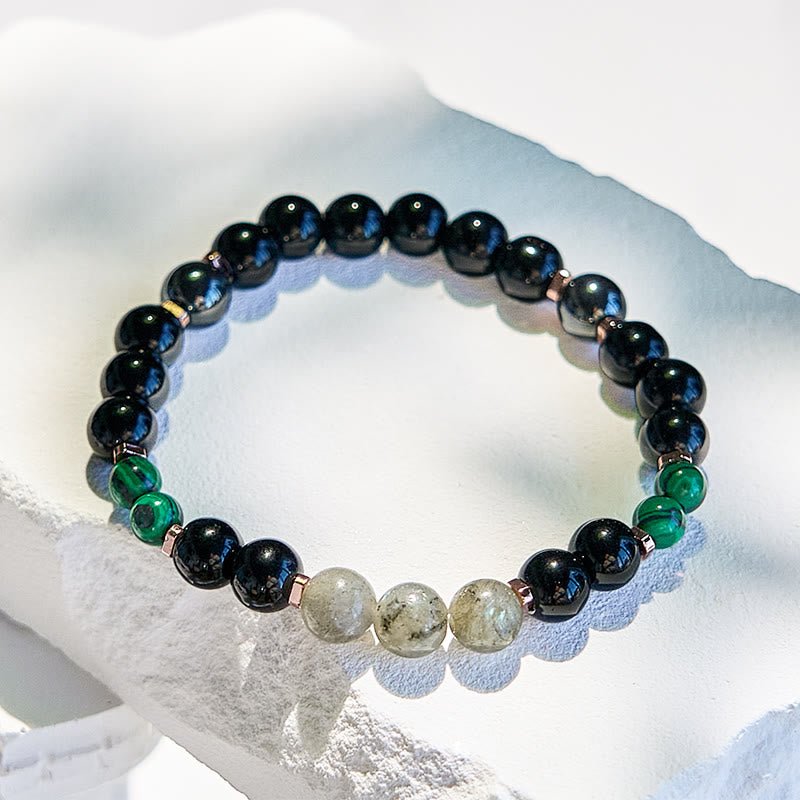 Olivenorma Perlenarmband aus schwarzem Onyx, Hämatit, Labradorit und Malachit