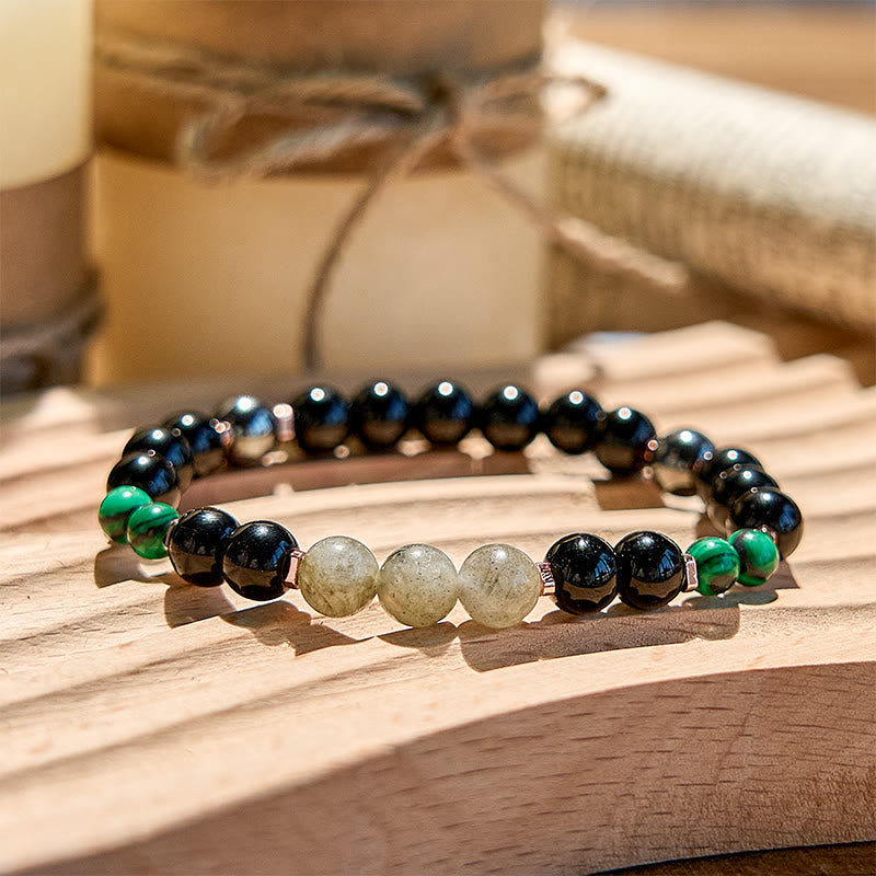 Olivenorma Perlenarmband aus schwarzem Onyx, Hämatit, Labradorit und Malachit