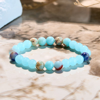 Olivenorma Armband mit Perlen aus natürlichem Agalmatolit und Aquamarin