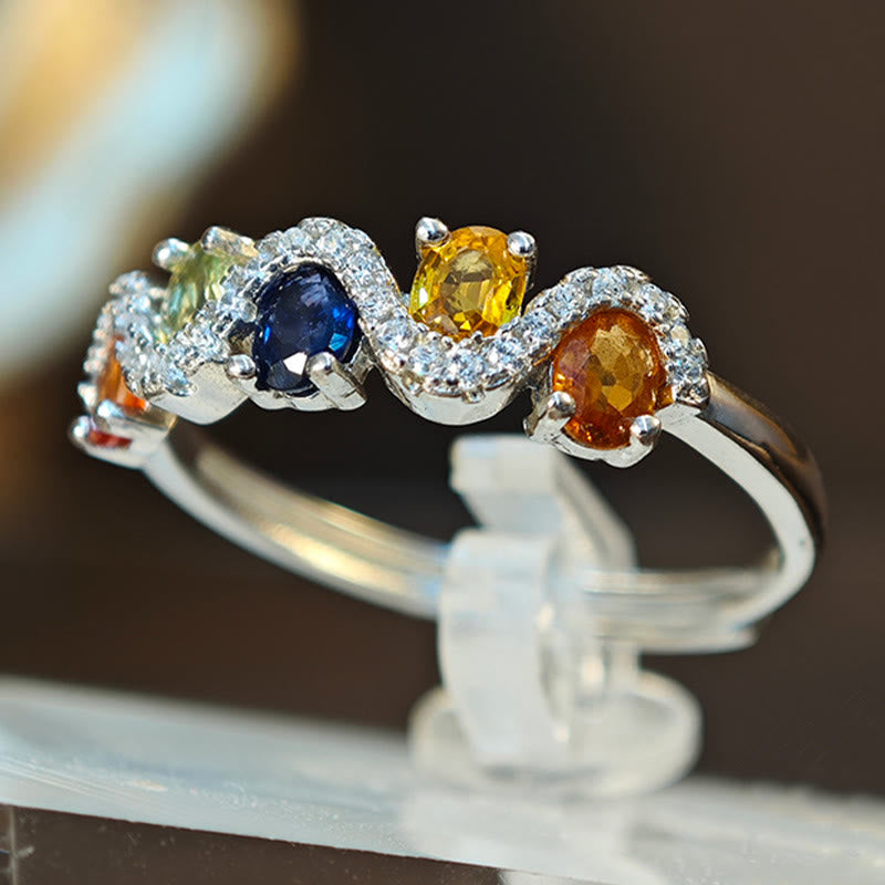 Olivenorma Ring mit Topas in natürlicher Farbe und Wellenform