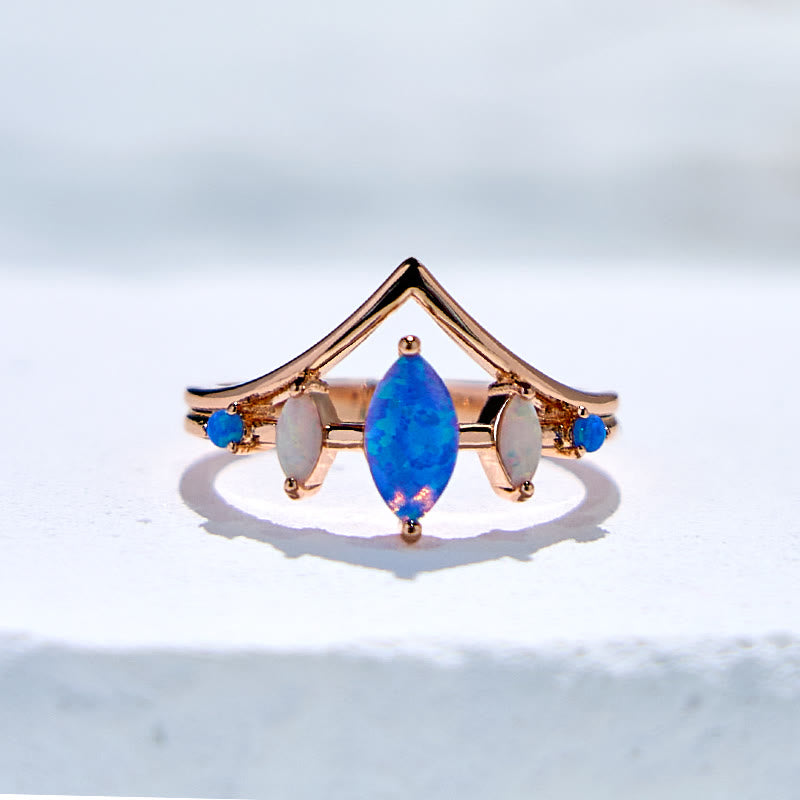 Olivenorma Kronenring mit natürlichem blauem und weißem Opal