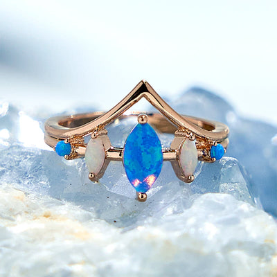 Olivenorma Kronenring mit natürlichem blauen und weißen Opal