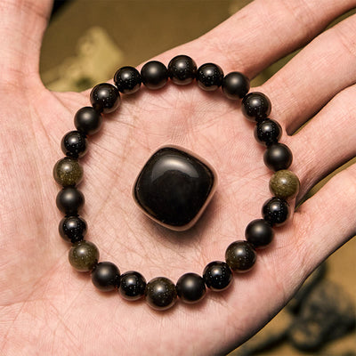 Olivenorma Herrenarmband mit schwarzen Onyx- und goldenen Obsidianperlen