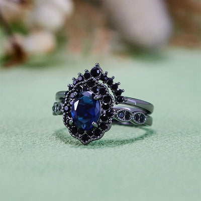 Olivenorma Brautset mit ovalem Saphir und Blumenmuster in Schwarz und Gold