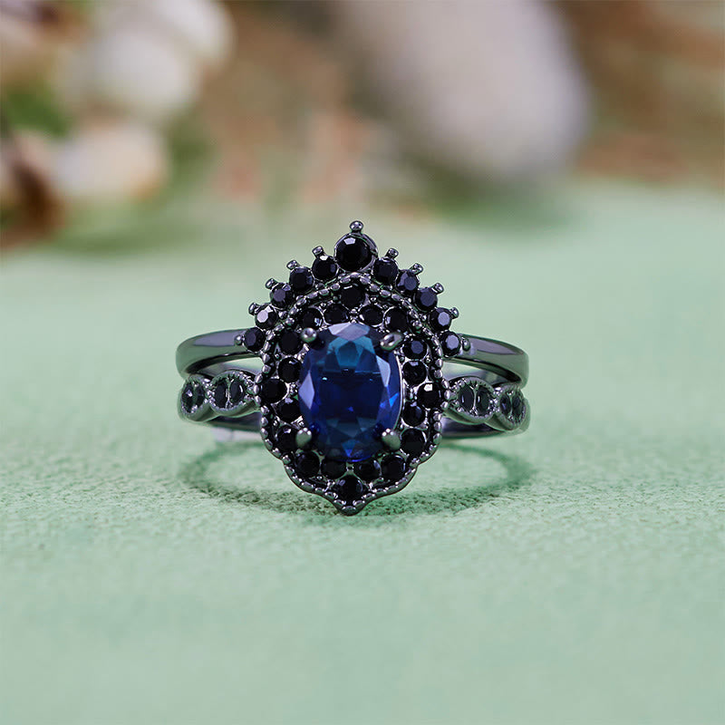 Olivenorma Brautset mit ovalem Saphir und Blumenmuster in Schwarz und Gold