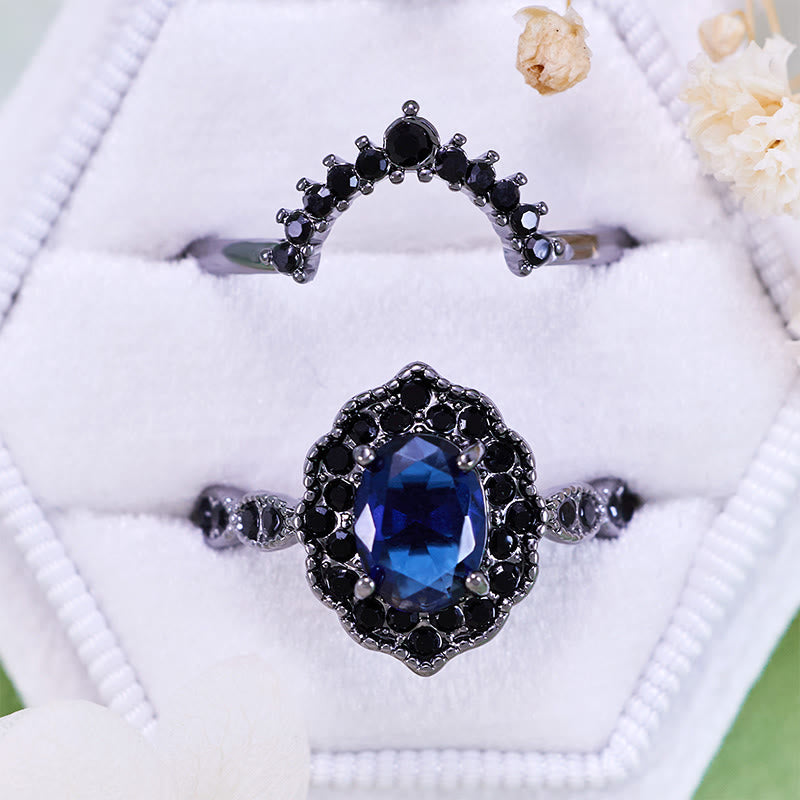 Olivenorma Brautset mit ovalem Saphir und Blumenmuster in Schwarz und Gold