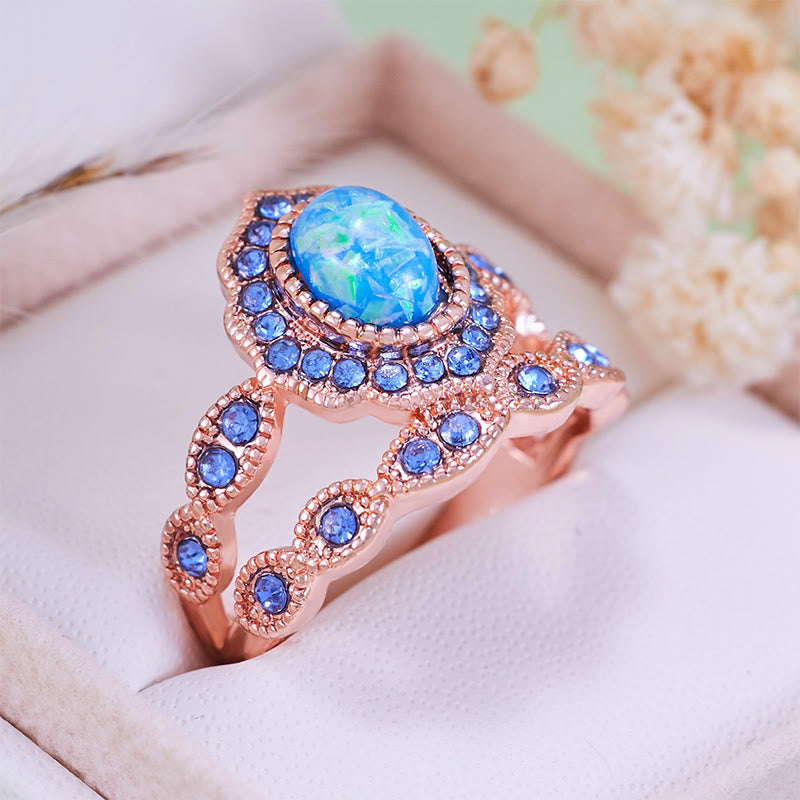 Olivenorma 2-teiliges Ringset aus Roségold mit blauem Opal und Saphir