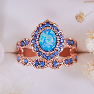 Olivenorma 2-teiliges Ringset aus Roségold mit blauem Opal und Saphir