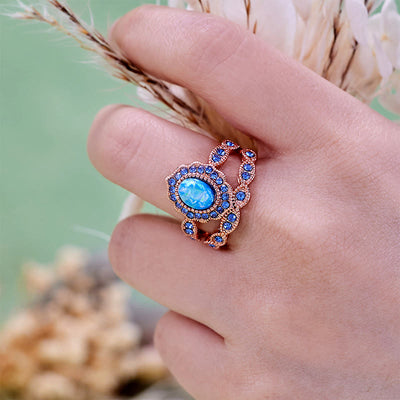 Olivenorma 2-teiliges Ringset aus Roségold mit blauem Opal und Saphir