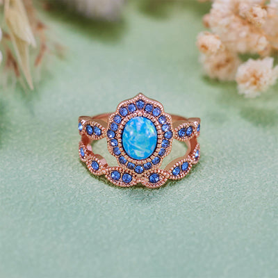 Olivenorma 2-teiliges Ringset aus Roségold mit blauem Opal und Saphir