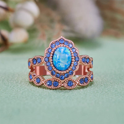 Olivenorma 2-teiliges Ringset aus Roségold mit blauem Opal und Saphir