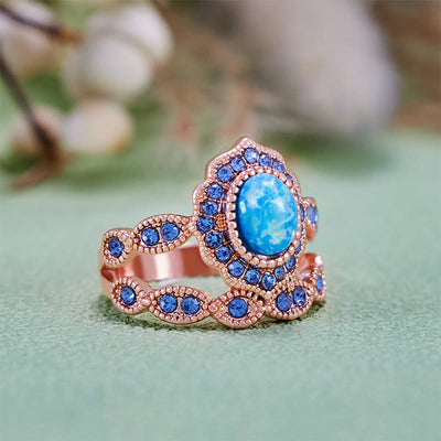 Olivenorma 2-teiliges Ringset aus Roségold mit blauem Opal und Saphir