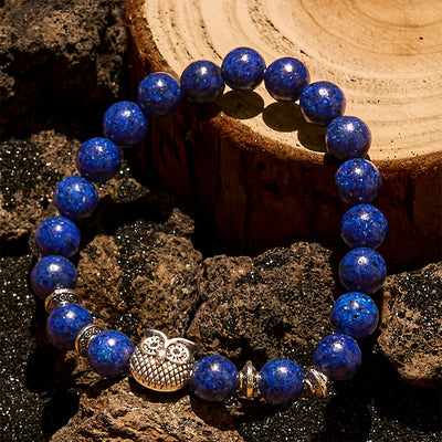 Olivenorma 8 mm großes Perlenarmband mit Eulenmotiv aus natürlichem Lapislazuli