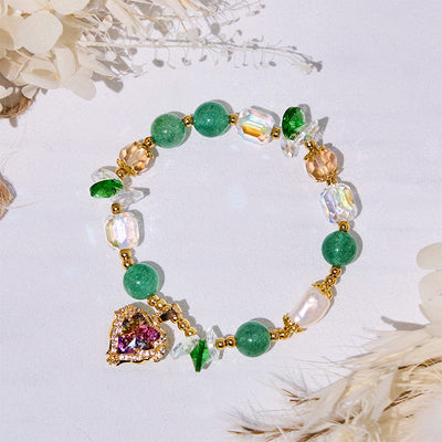 Olivenorma Armband mit Herzanhänger aus klarem Glas mit grünem Aventurin