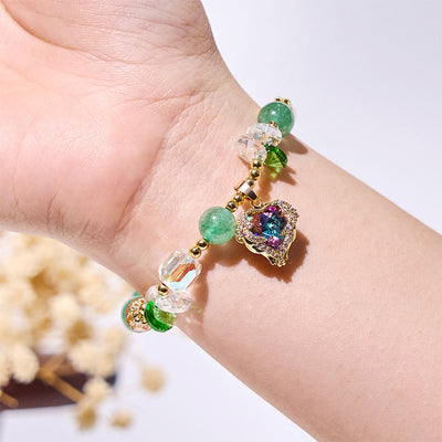 Olivenorma Armband mit Herzanhänger aus klarem Glas mit grünem Aventurin